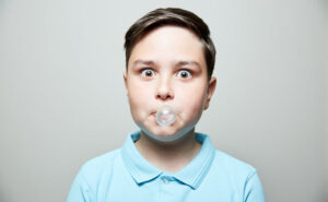 Chewing Gum with Braces - Balhoff Orthodontics