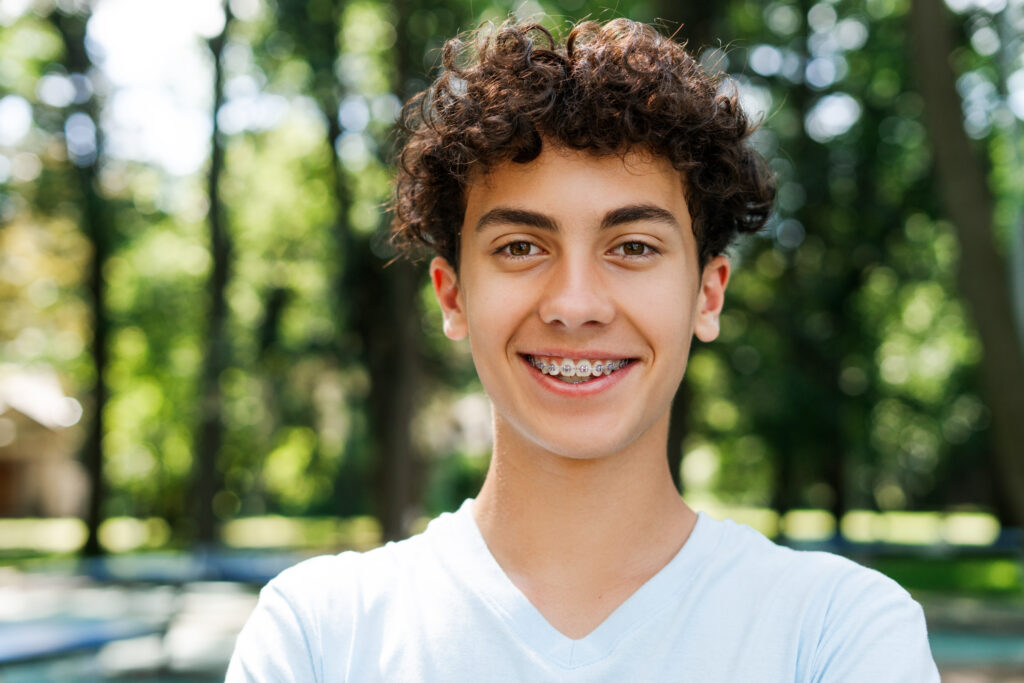 Invisalign vs Braces for Teens at Balhoff Orthodontics in Lafayette Teen patient considering Invisalign or braces at Balhoff Orthodontics in Lafayette, LA